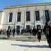 Masters level and PHD students process out of Rackham Auditorium as they walk over to Hill Auditorium for commencement on Friday morning. Melanie Maxwell I AnnArbor.com